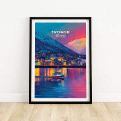 Tromsø Arctic City Lights and Aurora Sky Print | Nordic Travel Art displayed in a black frame, showcasing vibrant city lights.
