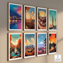 Tromsø Arctic City Lights and Aurora Sky Print | Nordic Travel Art displayed among other travel posters on a wall.