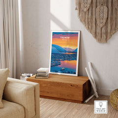 Tromsø City Lights and Snowy Hills Print | Northern Norway Wall Decor displayed in a cozy living room.