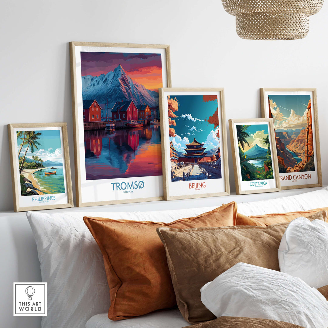 Tromsø Norway Art Print displayed among framed travel posters in a cozy living room setting.