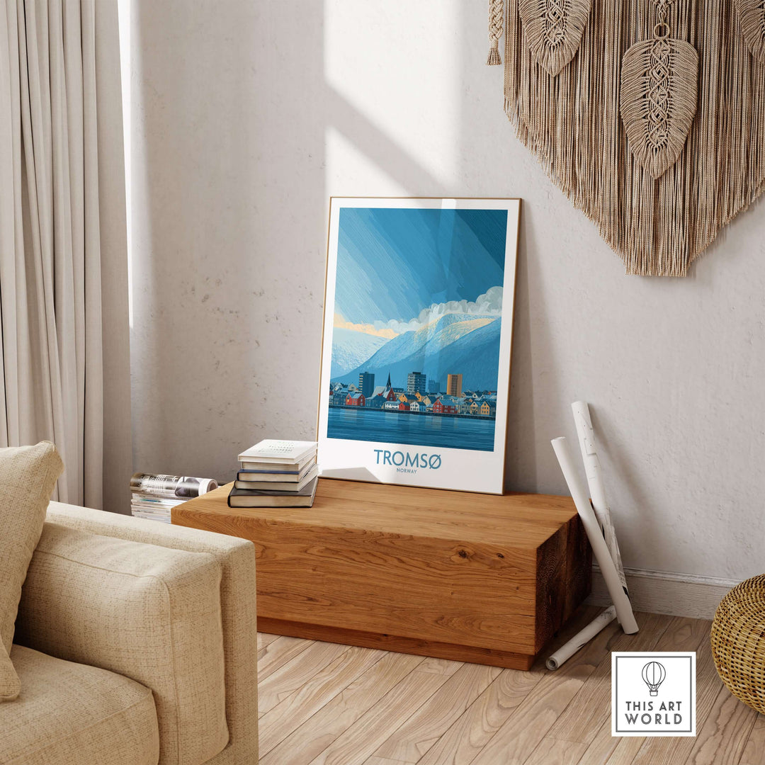 Tromsø Norway Art Print | Snowy Mountain City Poster displayed in a modern living room with wooden decor.