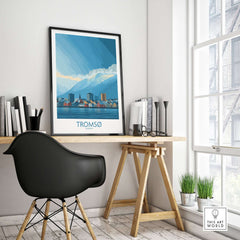 Tromsø Norway Art Print | Snowy Mountain City Poster displayed on a wall above a stylish desk in a modern interior.