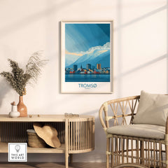 Tromsø Norway Art Print | Snowy Mountain City Poster displayed in a modern living room with natural decor.