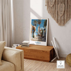 Tunisia Poster - North Africa Wall Art with Camels displayed in a stylish living room setting.
