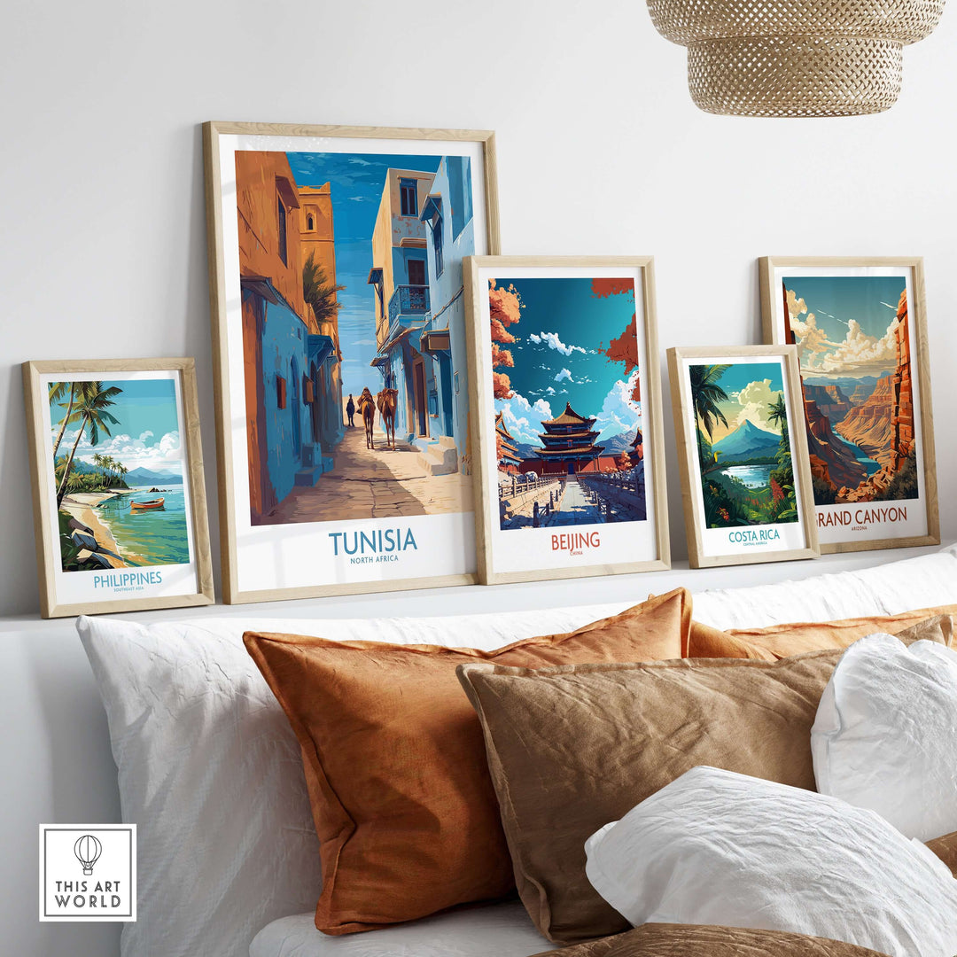 Framed Tunisia poster and other travel art prints displayed in a stylish living room setting.