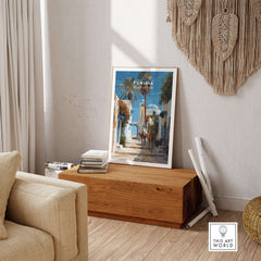 Tunisia Street Scene Print - Camels in the City Poster - Historic Town Wall Decor displayed in a cozy room.