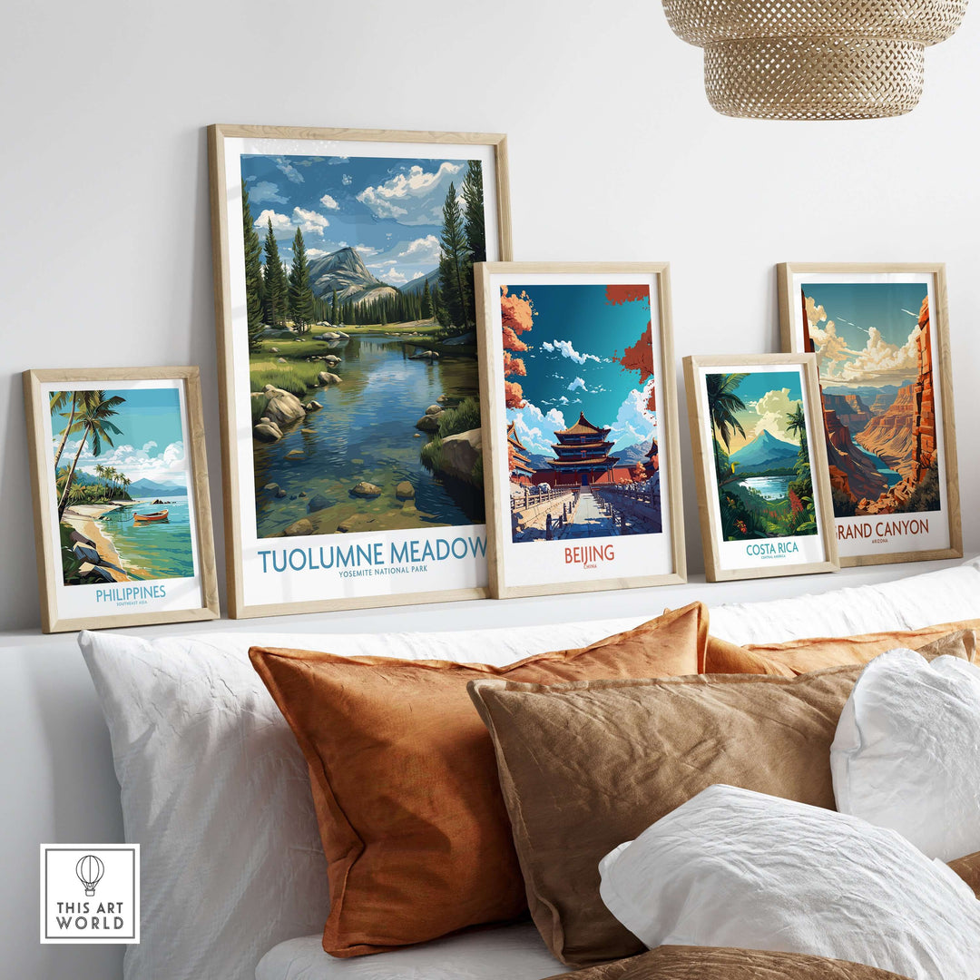 Tuolumne Meadows Poster Yosemite Art Print displayed among framed travel art prints on a cozy couch.