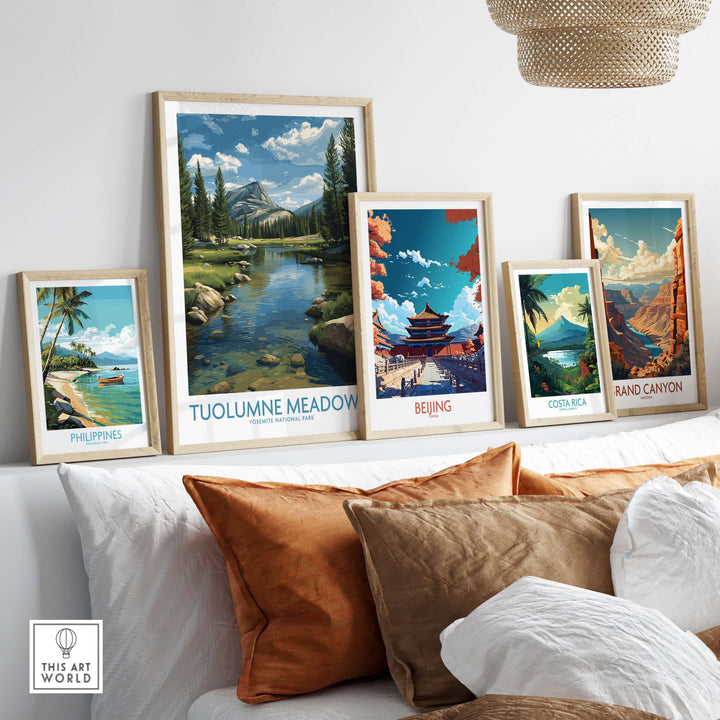 Tuolumne Meadows Poster Yosemite Art Print displayed among framed travel art prints on a cozy couch.