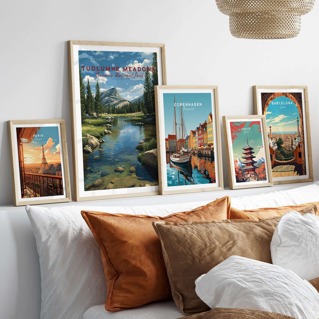 Tuolumne Meadows Print | Yosemite Wall Art Poster displayed among other framed art on a stylish sofa.