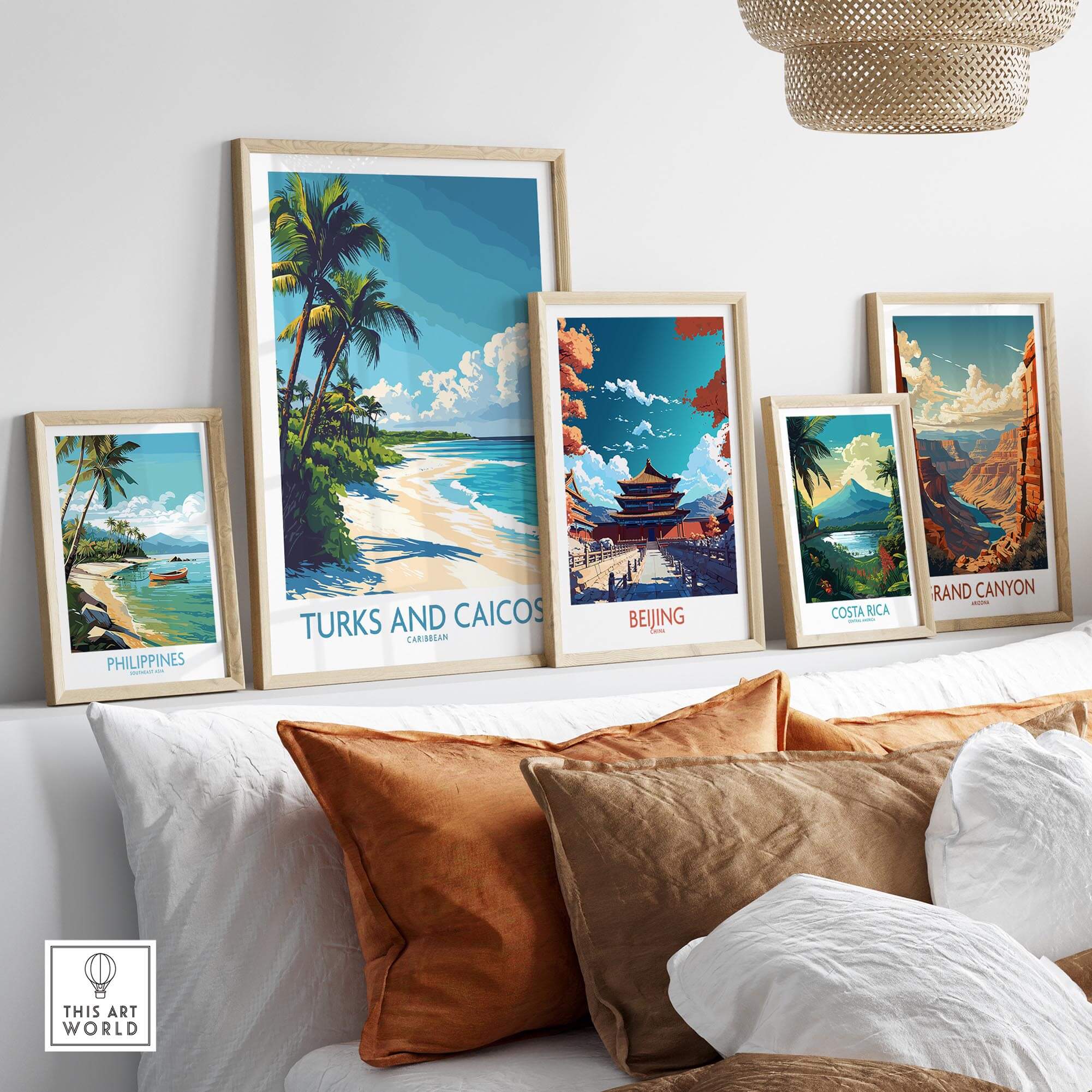 Turks and Caicos Poster displayed among framed travel posters on a stylish sofa in a bright living room.