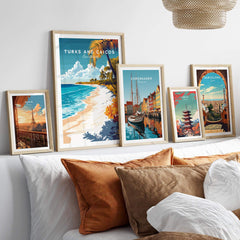 Turks and Caicos Wall Art displayed among other travel-themed posters on a stylish bed setup.