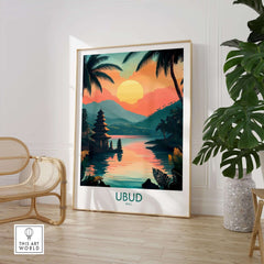 Ubud Bali Travel Poster featuring vibrant sunset and serene landscape reflection in a stylish living room setting.