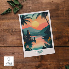 Ubud Bali Travel Poster showcasing vibrant sunset over a serene river with palm trees and traditional architecture.