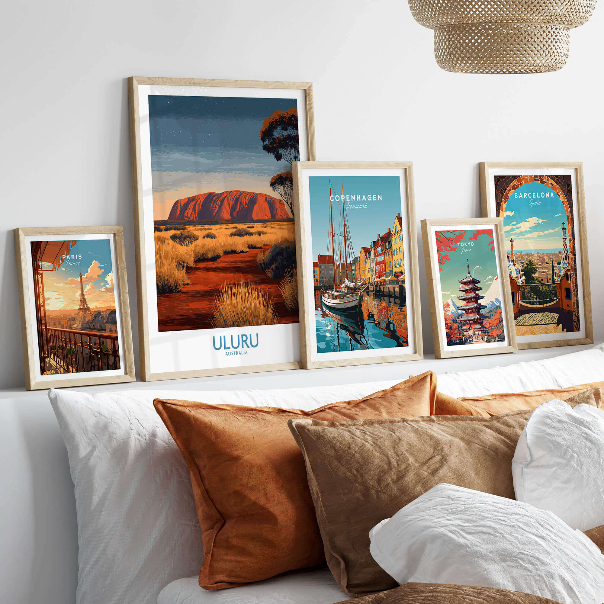 Uluru Australia Poster | Desert Sunset Canvas Print displayed among travel art in a stylish living room setting.