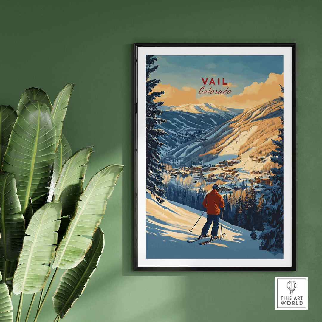 Vail Print Colorado Ski Poster featuring skier in snowy mountains, framed on green wall with plant.