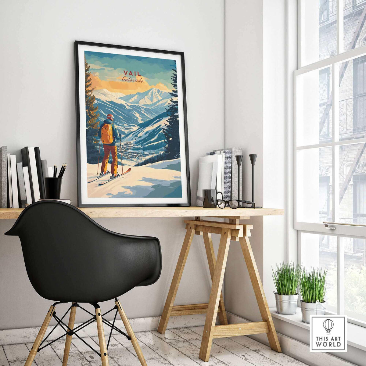 Vail Ski Poster - Colorado displayed in a modern home office setting, showcasing snowy mountains and a skier.