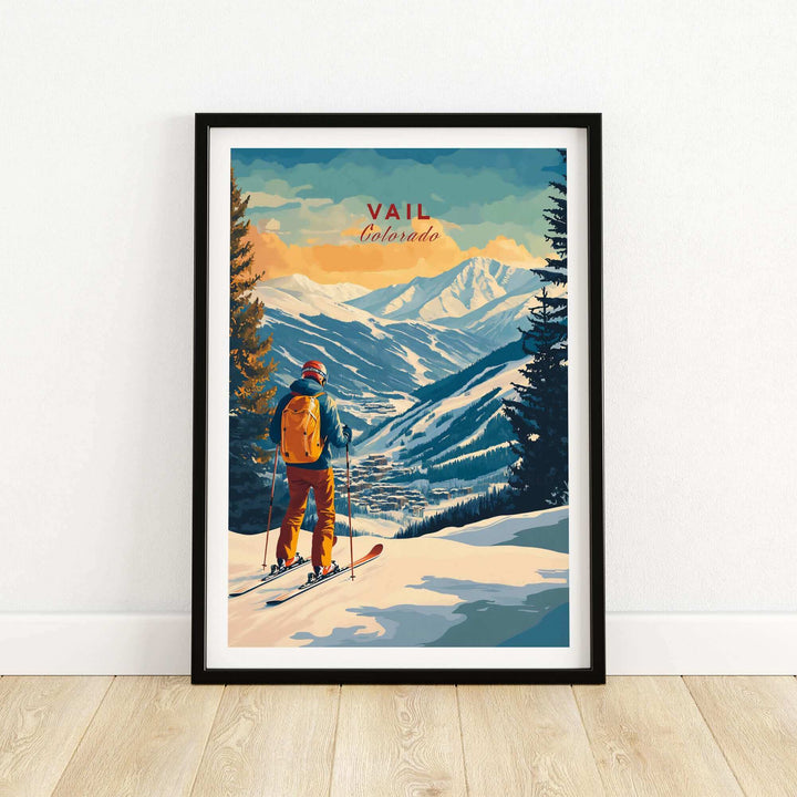 Vail Ski Poster featuring a skier overlooking snowy mountains in Colorado, framed for display against a white wall.