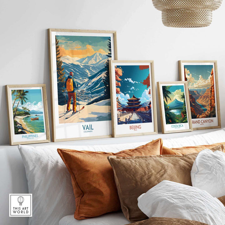 Wall art display featuring Vail, Colorado ski poster and international travel prints in a cozy living room setting.