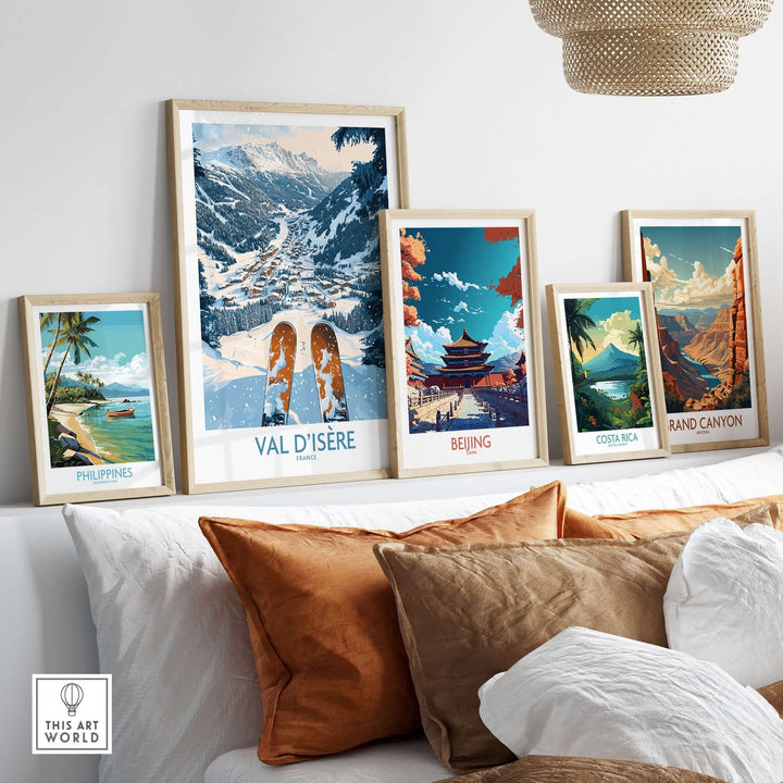 Val d'Isère poster and travel art prints displayed in a stylish living room setting, showcasing outdoor adventure themes.