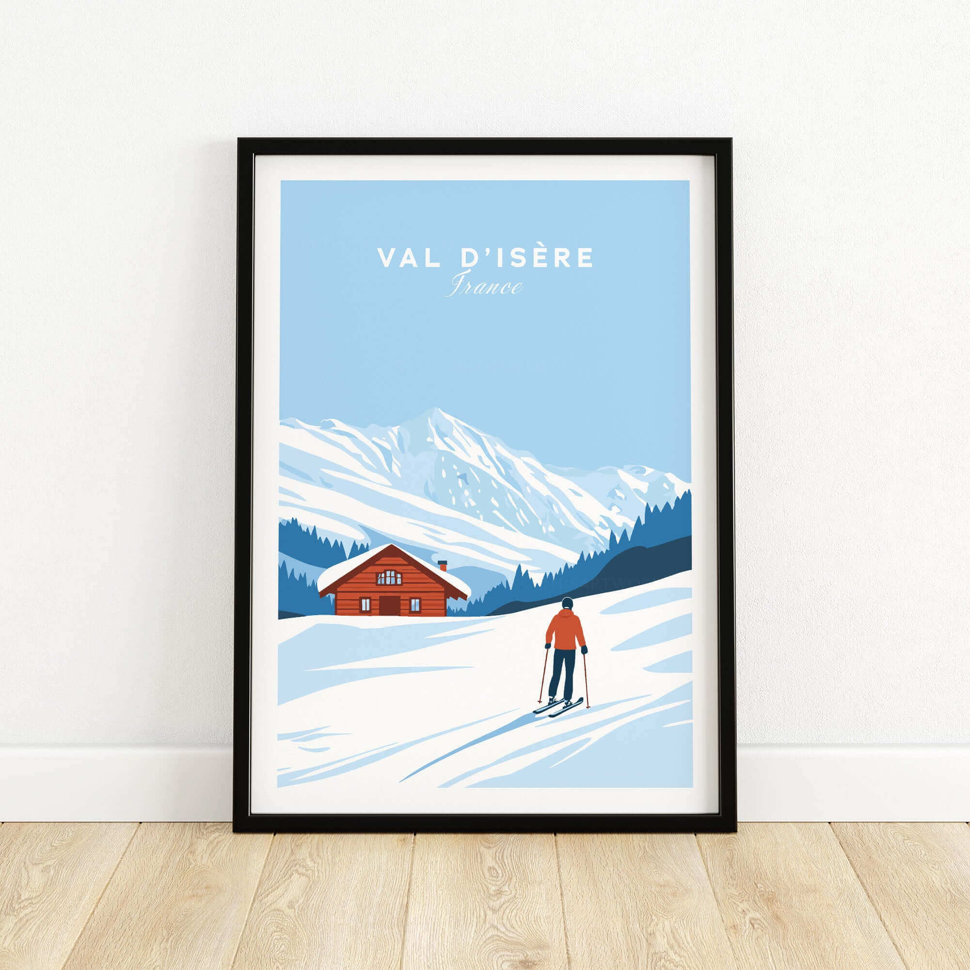 Val-d'Isère ski poster featuring a skier in front of a snowy mountain and chalet, capturing the charm of France's ski resorts.