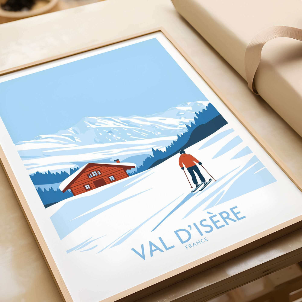 Vintage-style Val-d'Isère print featuring a skier and a red cabin against snowy mountains in France.