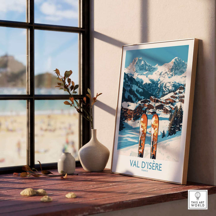 Val-d'Isère ski poster featuring snowy mountains and skis on a sunny windowsill, perfect for winter sports enthusiasts and home decor.