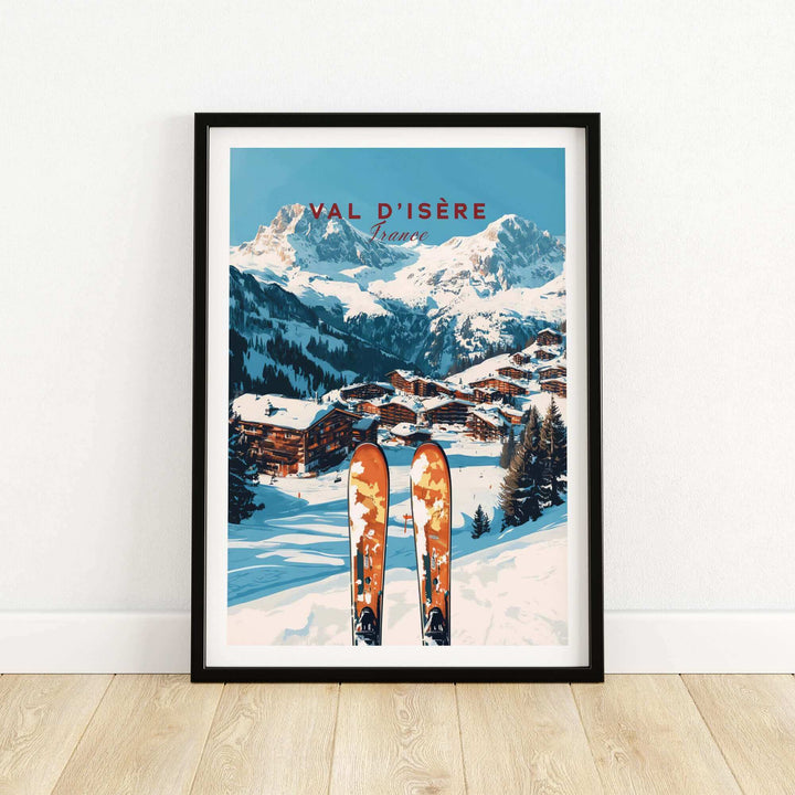 Vintage Val-d'Isère ski print featuring snowy mountain landscape and village, with ski tips in foreground, framed and ready to hang.