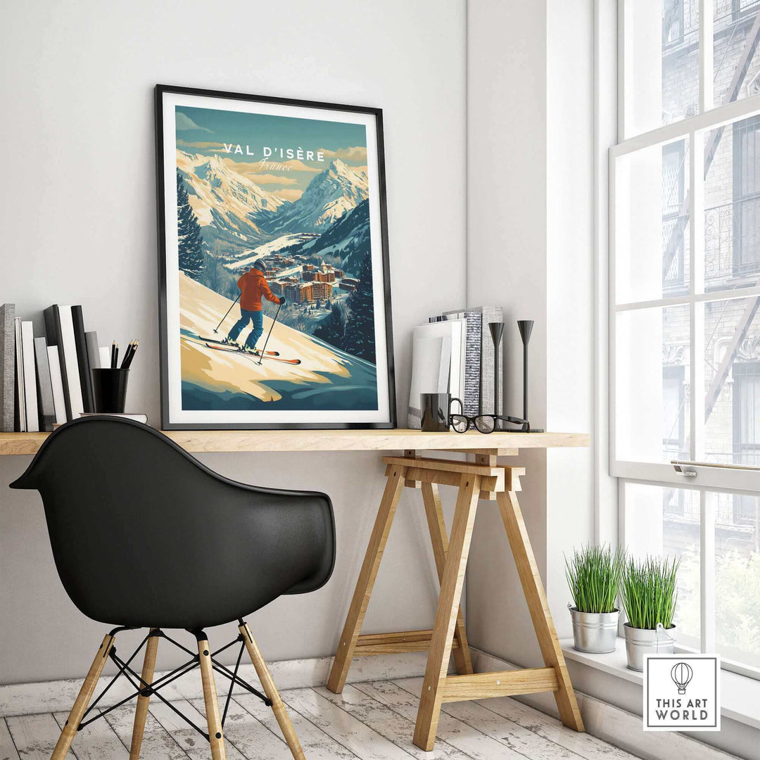 Val-d'Isère ski print wall art displayed above a desk in a modern room, featuring a skier and mountain landscape.