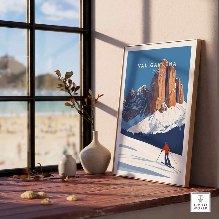 Stylish Val Gardena print of Italy featuring a ski poster theme, displayed in a sunny room with a scenic backdrop.