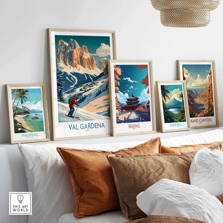 Val Gardena wall art ski poster framed with other travel prints including Beijing and Grand Canyon on a living room shelf.