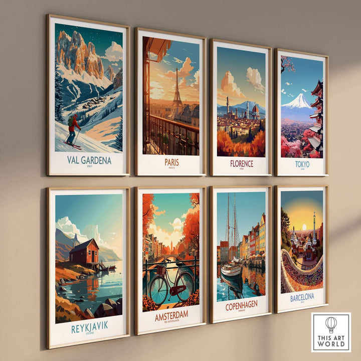 Gallery wall of travel posters featuring Val Gardena ski print and various city artworks, including Paris and Tokyo, by This Art World.