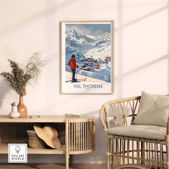 Val Thorens France ski print showcasing a scenic mountain view, displayed in a cozy interior setting with a stylish chair.