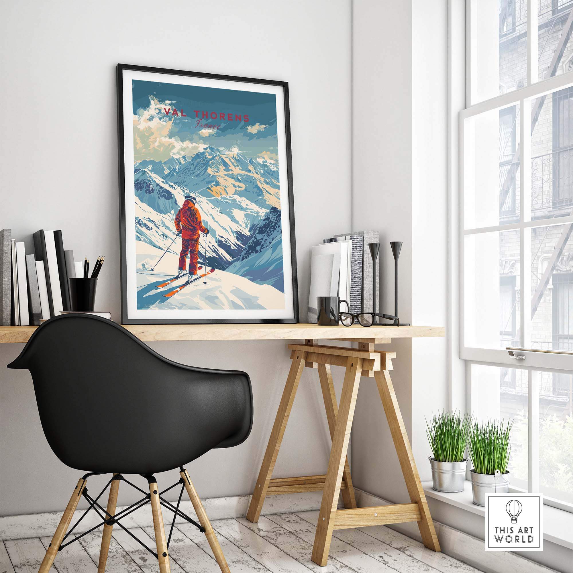 Val Thorens poster displayed in a modern office setting, showcasing snowy mountains and ski slopes design.