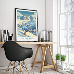 Val Thorens print displayed in a stylish home office, featuring ski equipment and beautiful mountain scenery.