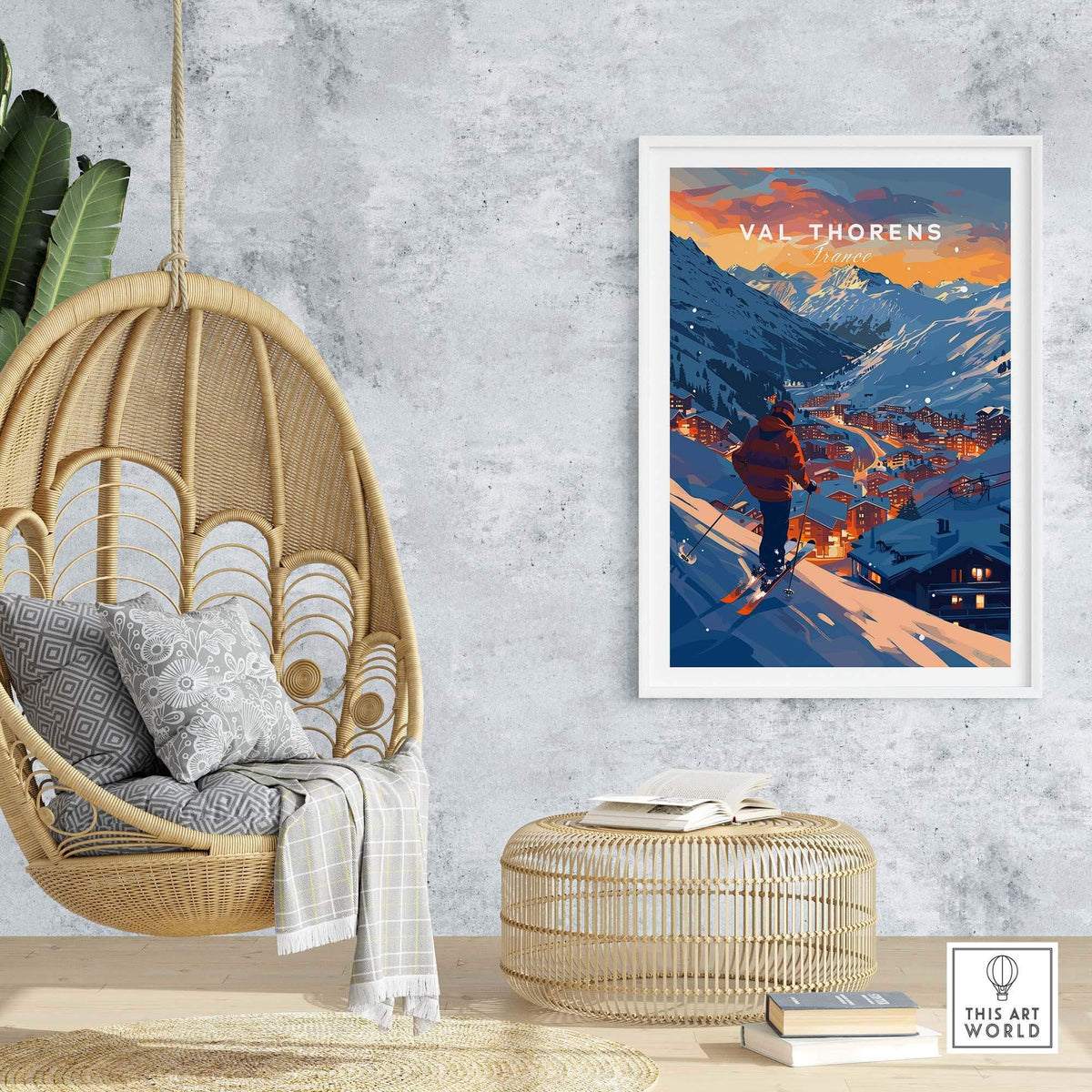 Val Thorens Ski Poster displayed in a modern home setting, showcasing the beautiful French Alps and a skier at sunset.