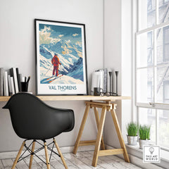 Val Thorens skiing poster displayed in a modern room with a stylish desk and chair, showcasing winter landscape art.