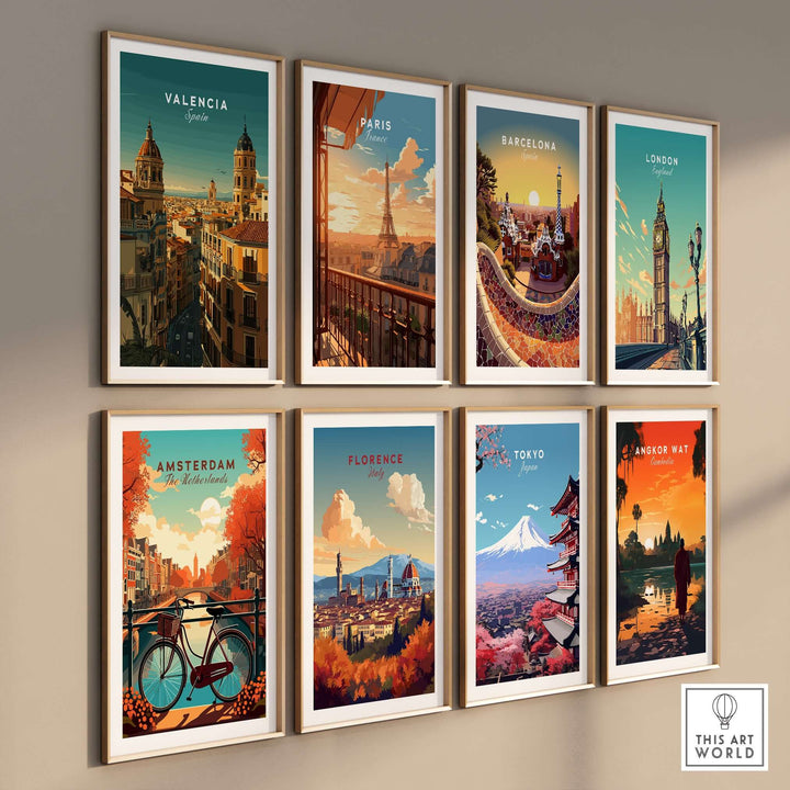 Nine framed travel art prints showcasing Valencia, Paris, Barcelona, London, Amsterdam, Florence, Tokyo, and Angkor Wat.