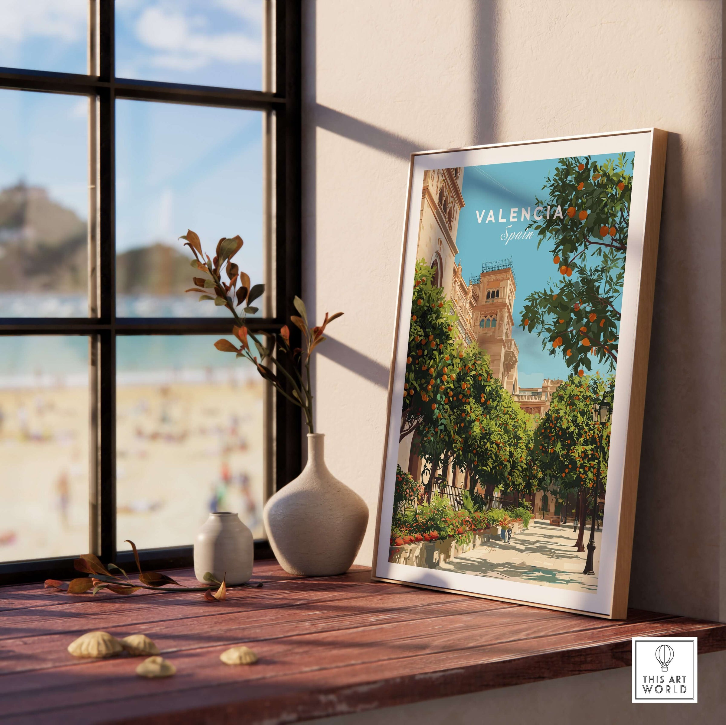 Valencia Spain Orange Tree Plaza Print - Historic City Street Poster displayed on a wooden table by a window.