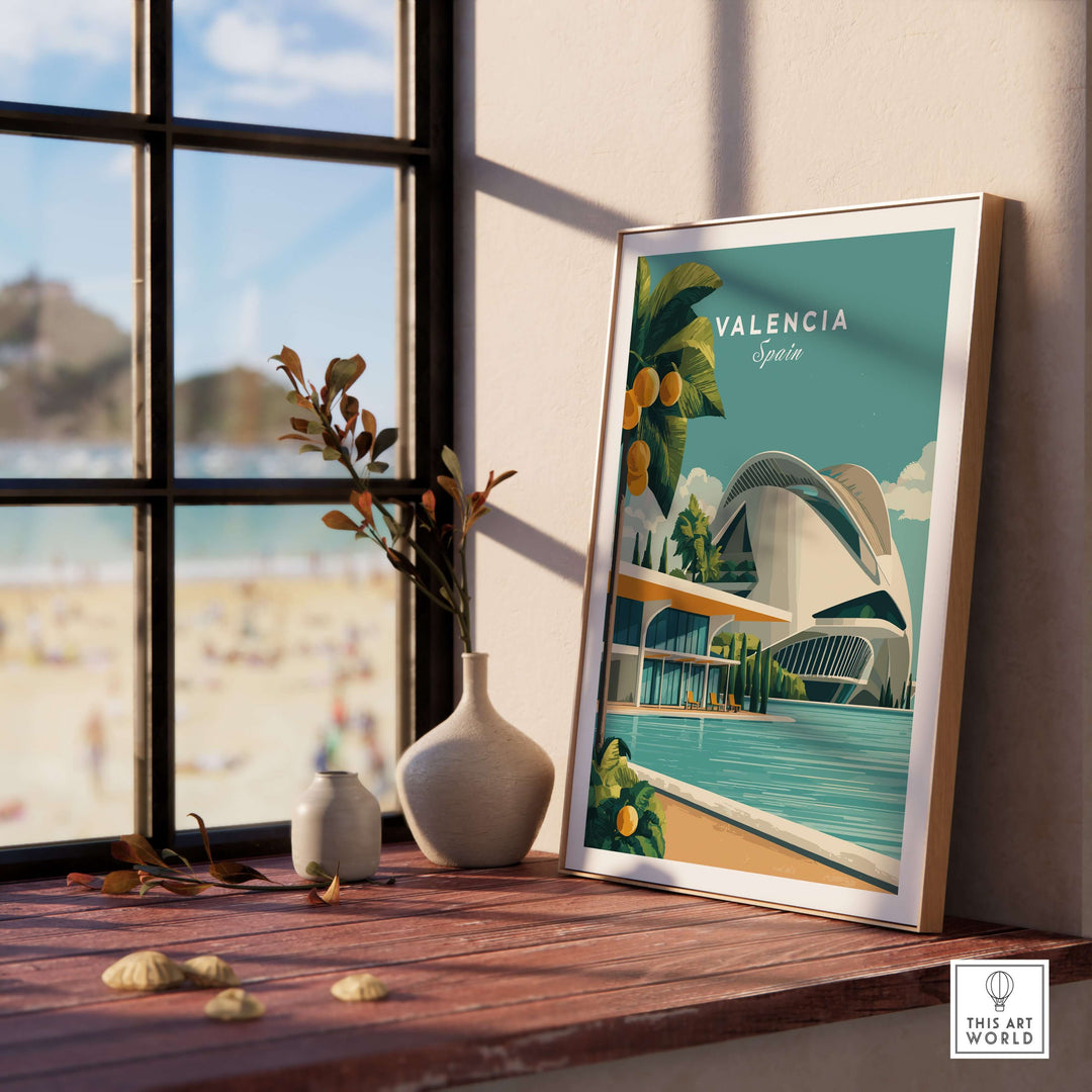 Valencia Spain print featuring the City of Arts and Sciences poster displayed on a windowsill with beach view.
