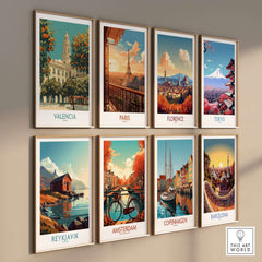 Valencia Spain Travel Poster displayed among other travel posters like Paris and Amsterdam on a stylish wall.