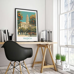 Valencia Spain Travel Poster displayed in a modern home office setting with a stylish black chair and vibrant decor.