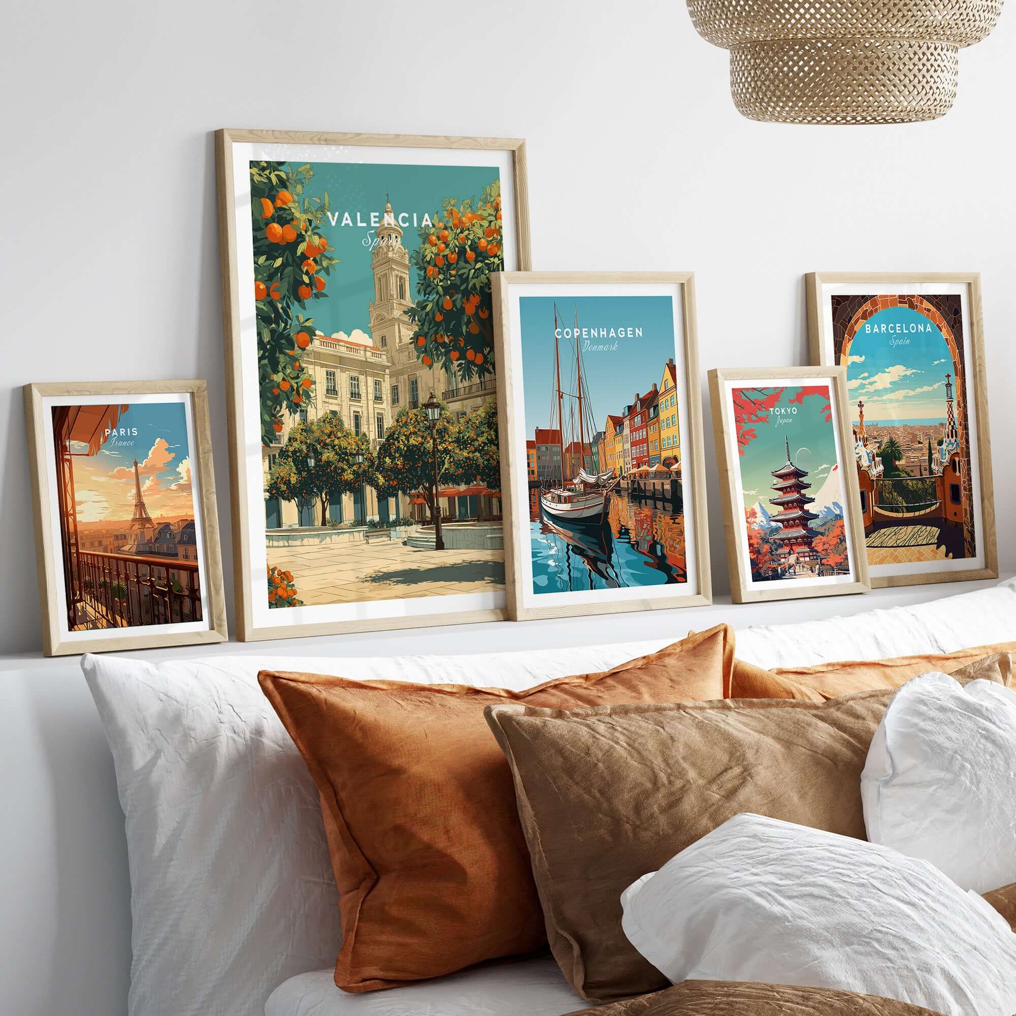 Valencia Spain Travel Print displayed among framed travel prints in a stylish living room setting.