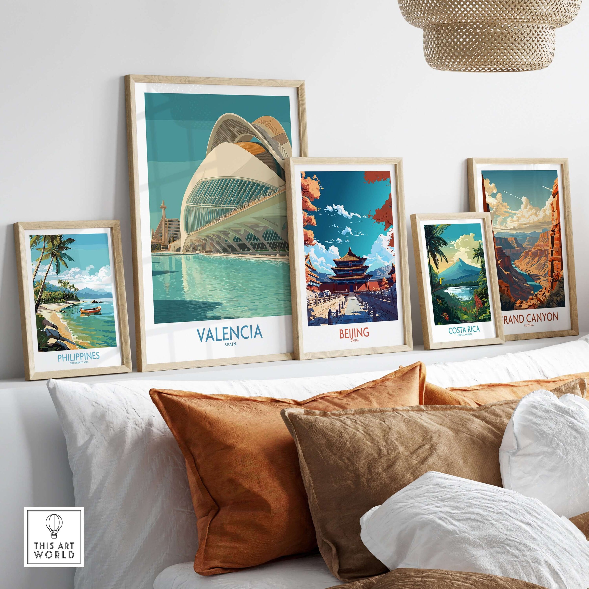 Valencia Travel Poster Spain displayed among other travel posters in a stylish home setting.