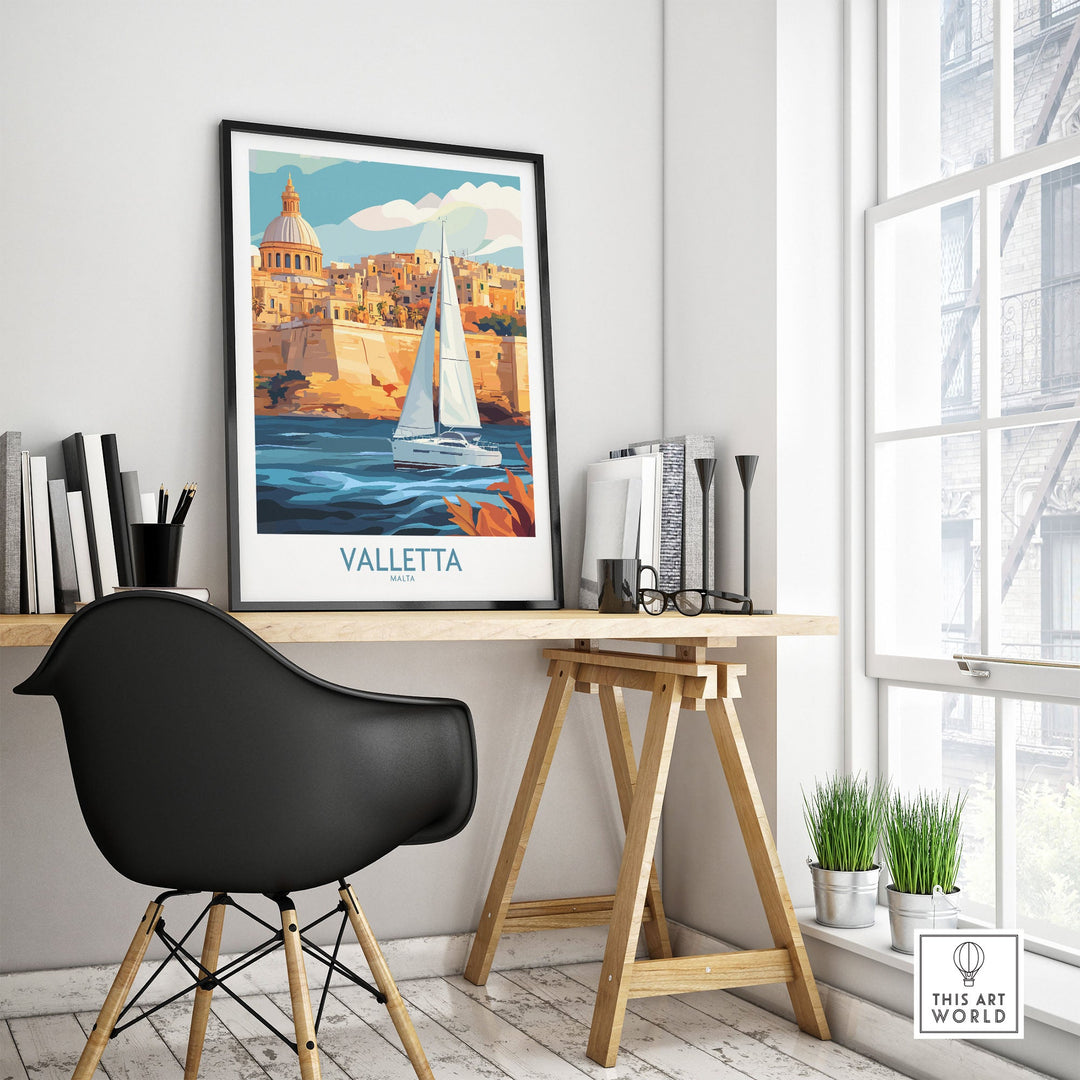 Valletta Malta poster on modern desk, showing vibrant cityscape and sailboat, perfect for home or office wall art.