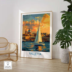 Valletta Malta Travel Poster featuring a sailing boat against a colorful sunset and historical architecture.