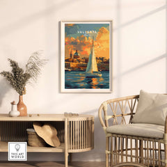 Valletta Malta Wall Art Print showcasing a sailboat at sunset by the charming city of Valletta, Malta.
