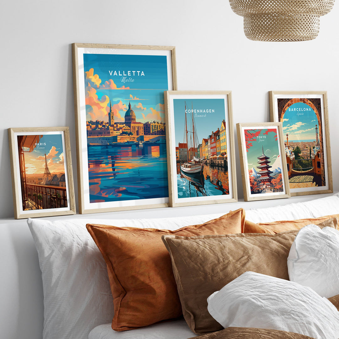 Valletta Malta poster on wall with vibrant travel prints of Copenhagen, Barcelona, and others in stylish living room setting.