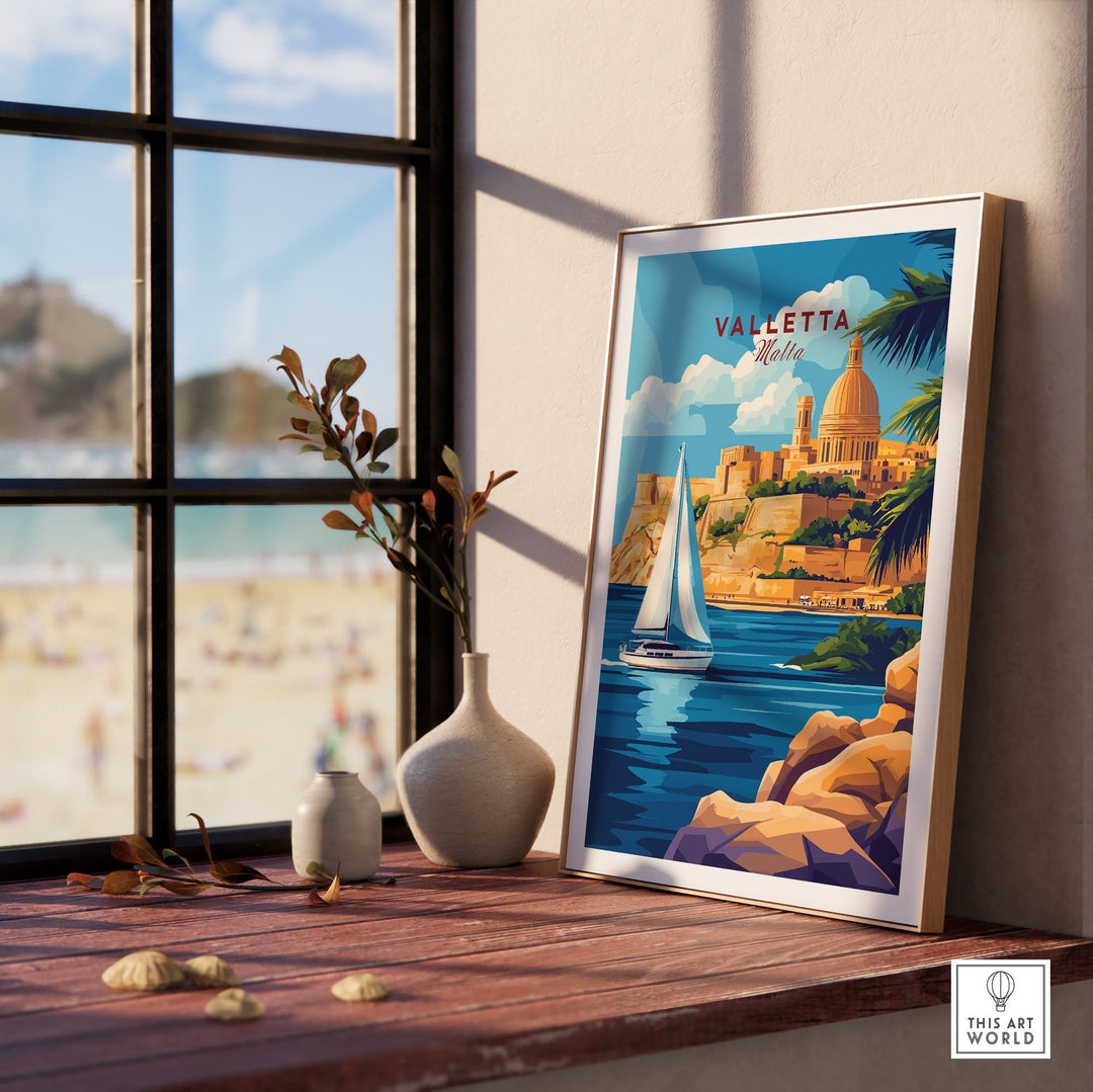 Valletta travel print on a sunny windowsill, showcasing Malta's vibrant cityscape with a sailboat, perfect for home decor inspiration.