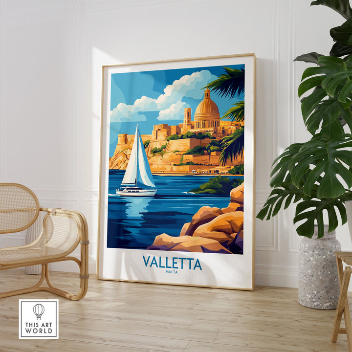 Valletta Wall Art poster featuring Malta's coastline, sea, and architecture in a vibrant room setting with plants and chairs.