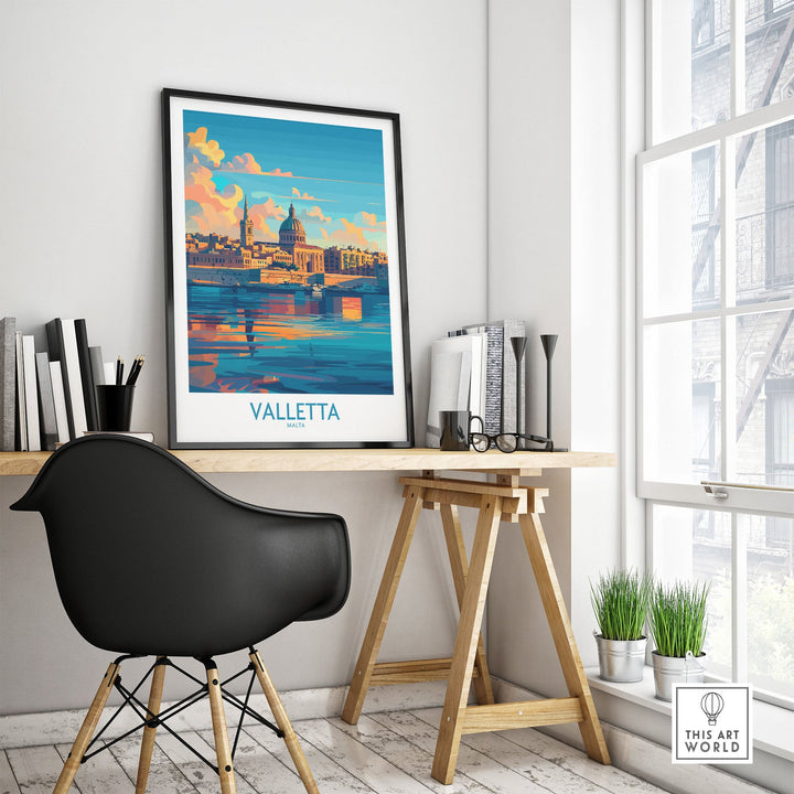 Valletta Wall Art Poster displayed in a modern workspace, featuring a colorful depiction of Malta's historic cityscape.